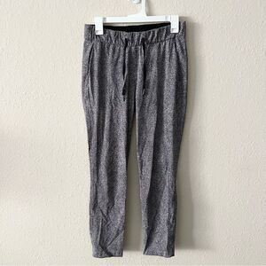 Lululemon Keep Moving Pant High Rise Black Print Size 4 Pockets Drawstring